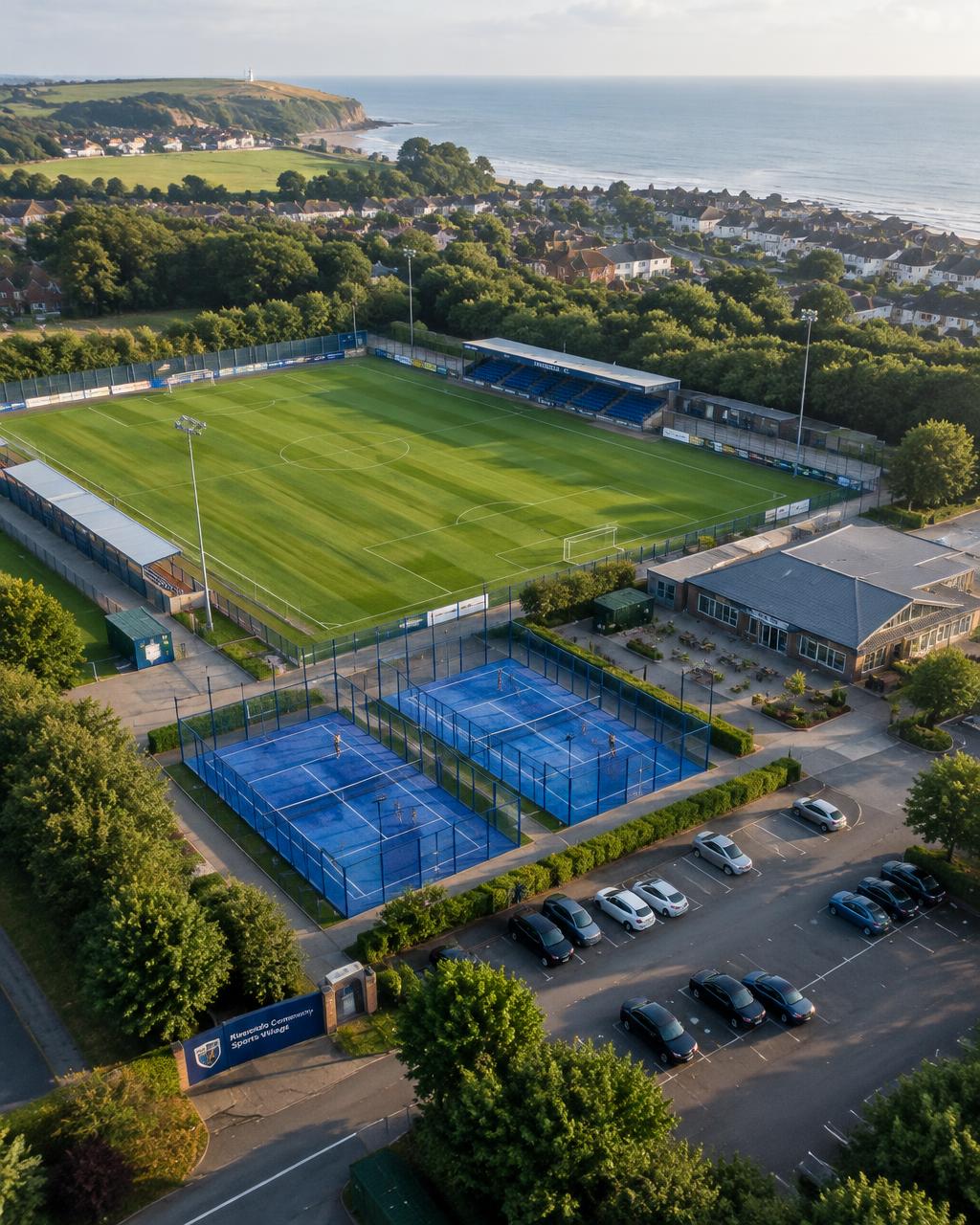 Aerial view of Eastbourne Sporting Village with the football pitch and padel courts